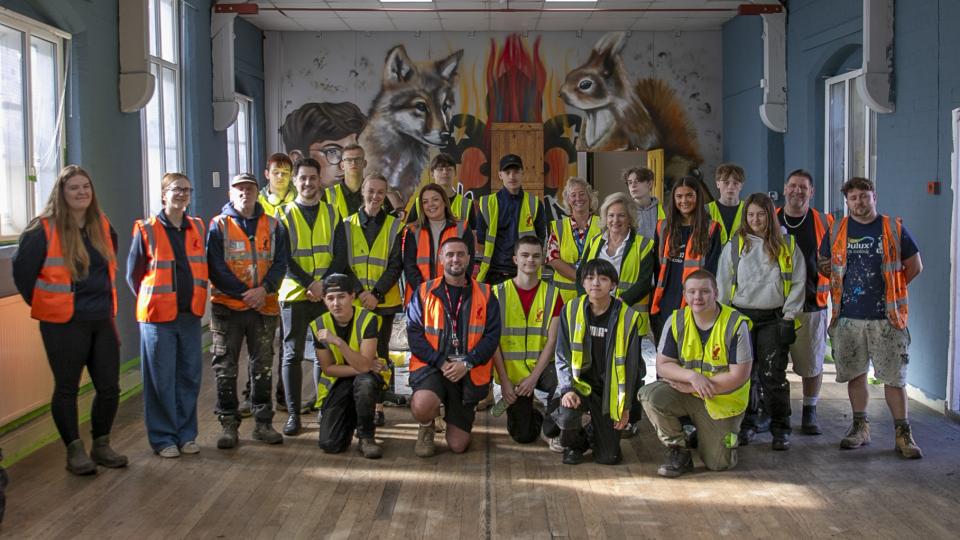Volunteer It Yourself - Group photo inside with Penny Taylor and Cllr Rowan Cozens