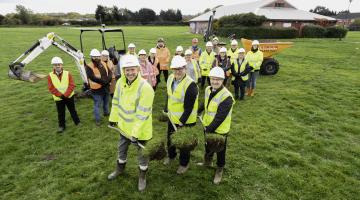 People celebrating the start of the Yorke Drive redevelopment work